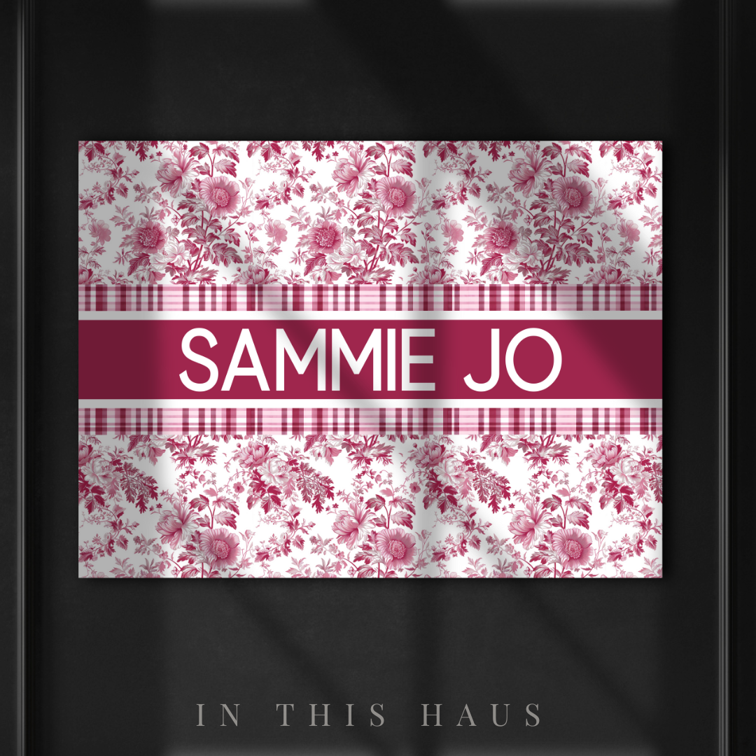 Close-up of delicate pink toile design on a custom name canvas, ideal for elegant wall decor.