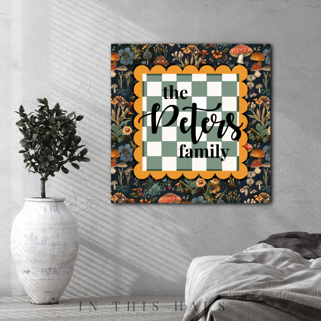 Personalized family plaque with floral mushroom pattern and green checkered design, customizable with family name.