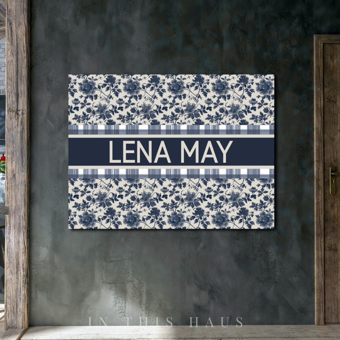 Custom wall art featuring Lena May in bold white text with vintage patterns