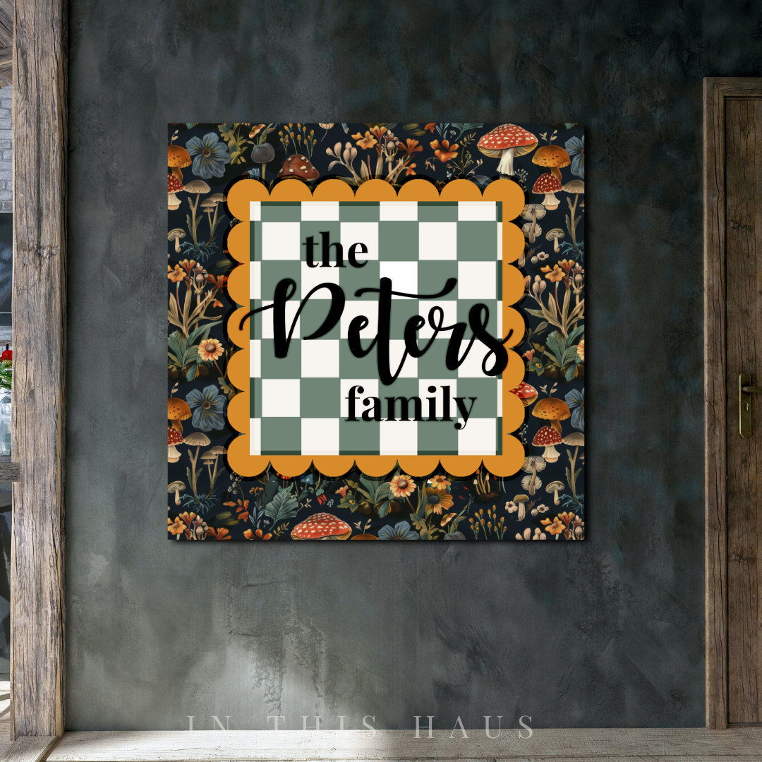 Personalized family plaque with floral mushroom pattern and green checkered design, customizable with family name.