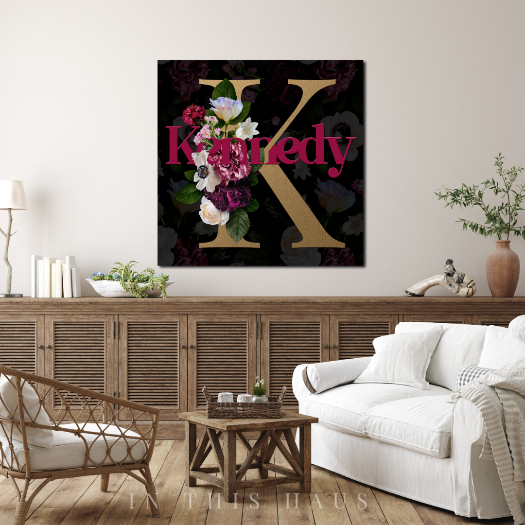 Nursery styled with the Kennedy Floral Initial Canvas adding a sophisticated touch.