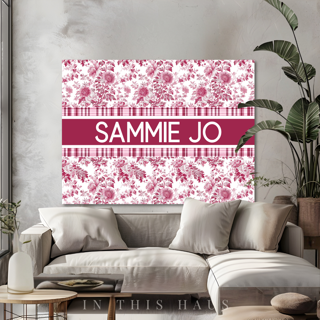 Elegant pink toile design on a custom name canvas, blending classic charm with modern aesthetics.