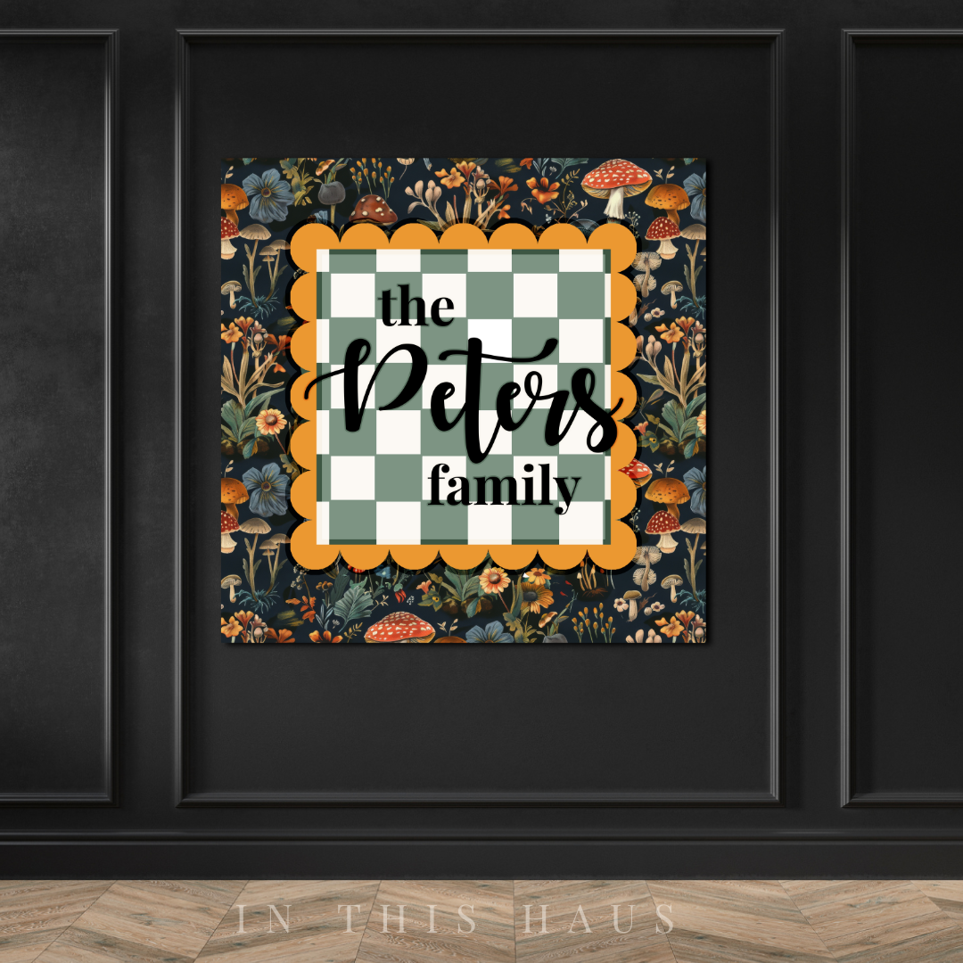 Personalized family plaque with floral mushroom pattern and green checkered design, customizable with family name.