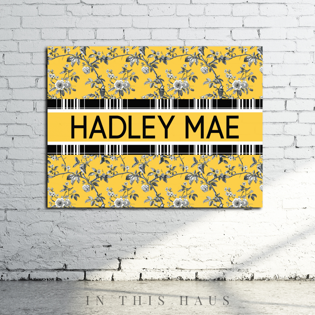 Nursery decor featuring the Hadley Mae Canvas for a bright and charming touch