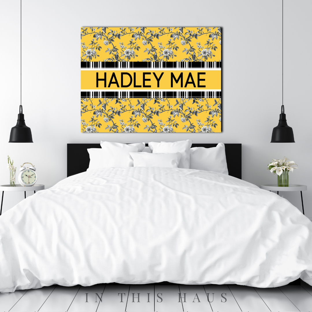 Close-up of the customizable name stripe on the vibrant yellow toile design.