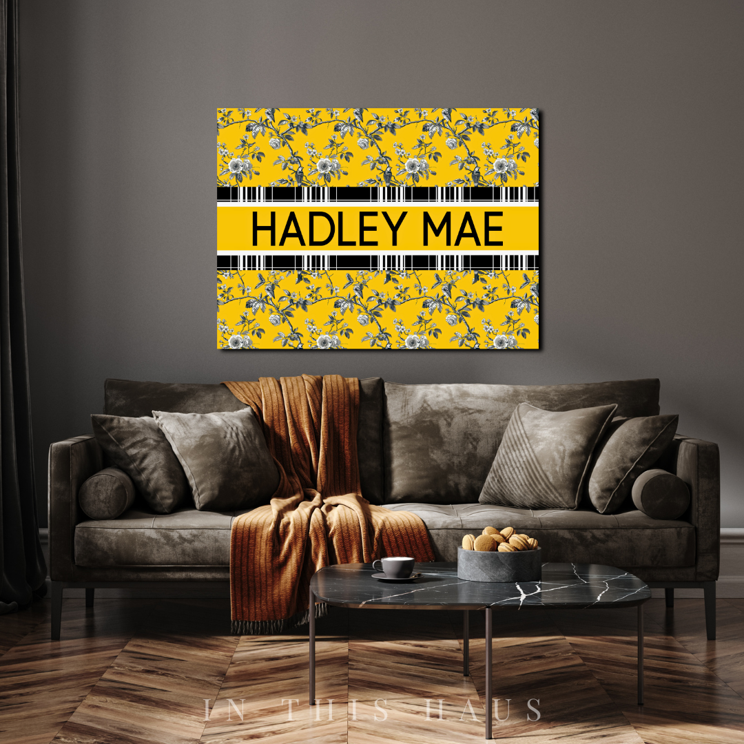 Close-up of the customizable name stripe on the vibrant yellow toile design.