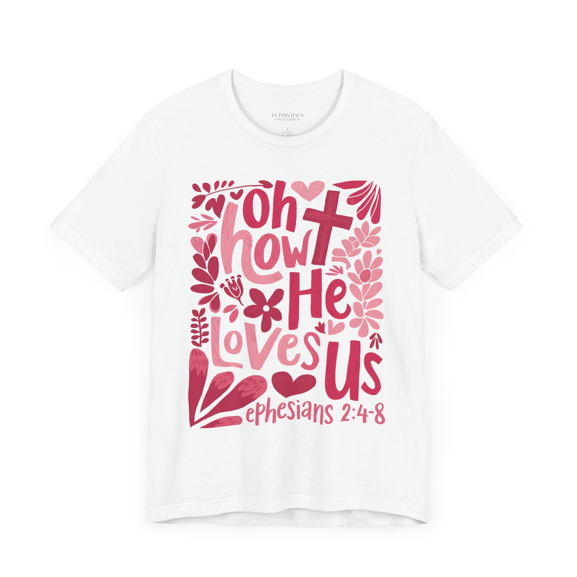 Religious T-shirt featuring a cross and floral illustrations.
