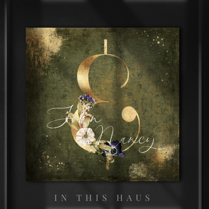 Close-up of the personalized names and ampersand symbol on the fall-inspired canvas.