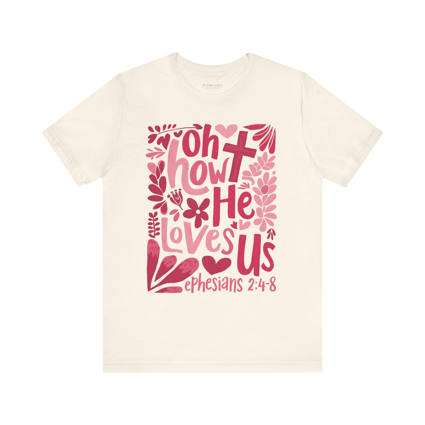 Faith-based unisex graphic tee in pink and red tones.
