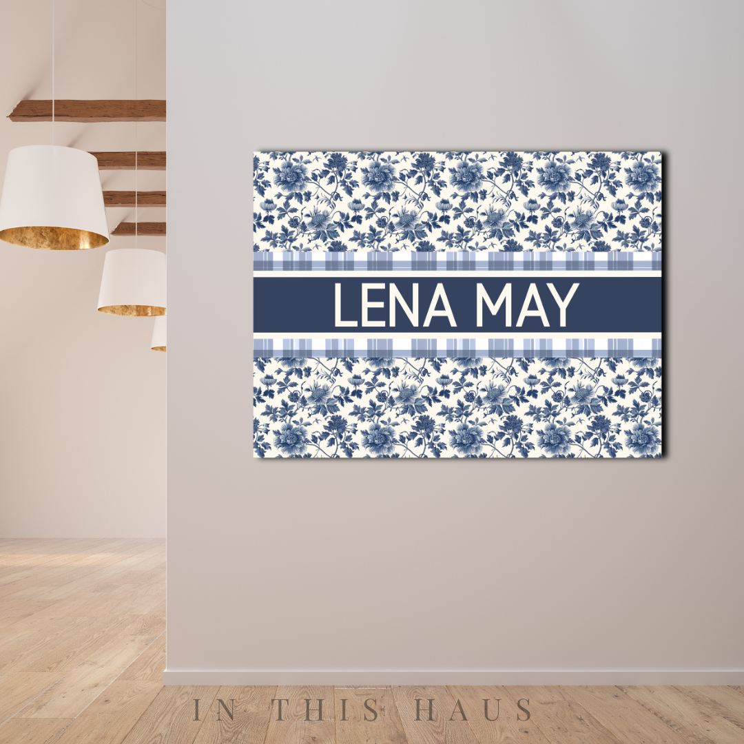 Elegant nursery decor with a personalized name and classic floral design
