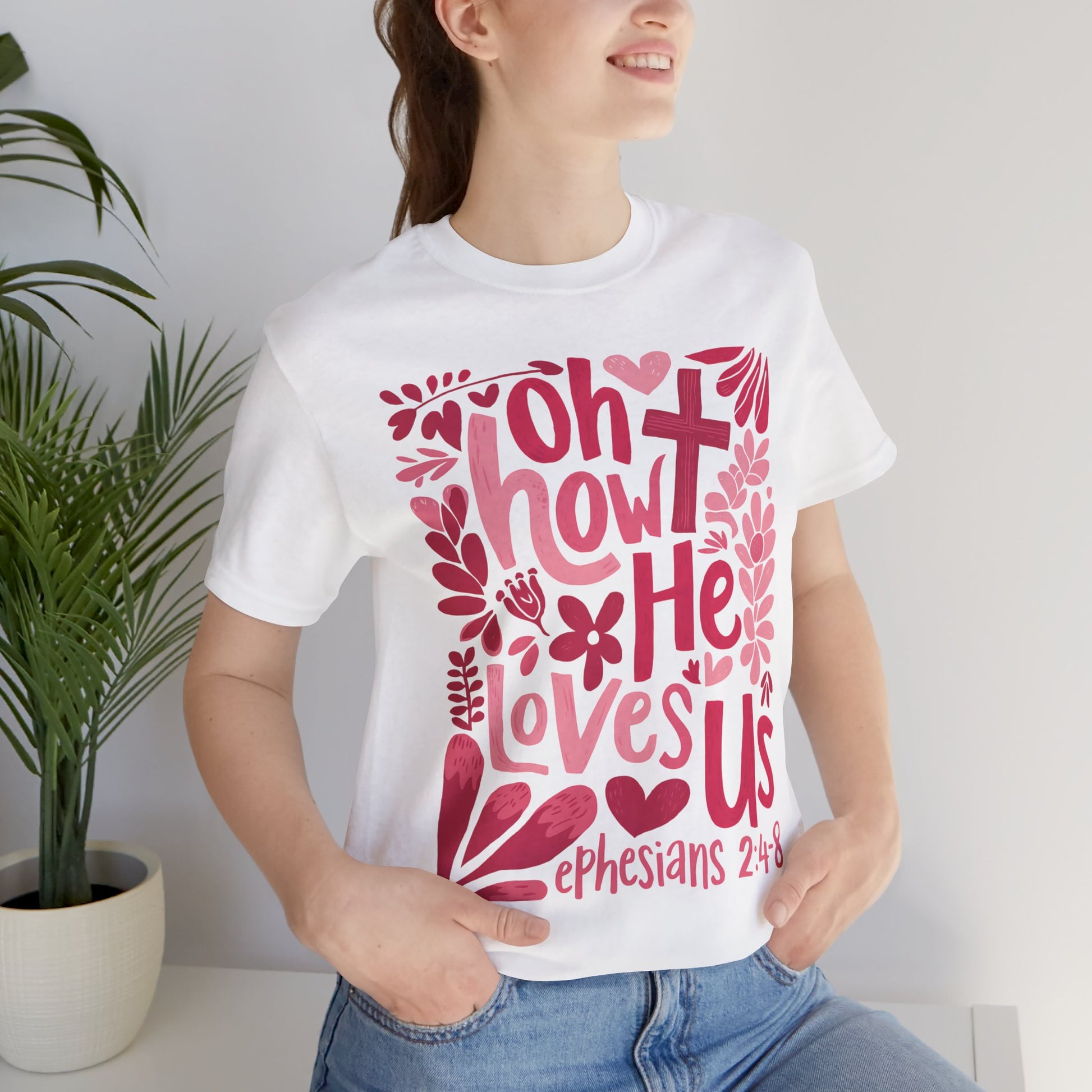 Christian graphic T-shirt with bold and colorful scripture art.
